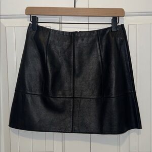 Bebe Genuine Leather mini skirt in Black
